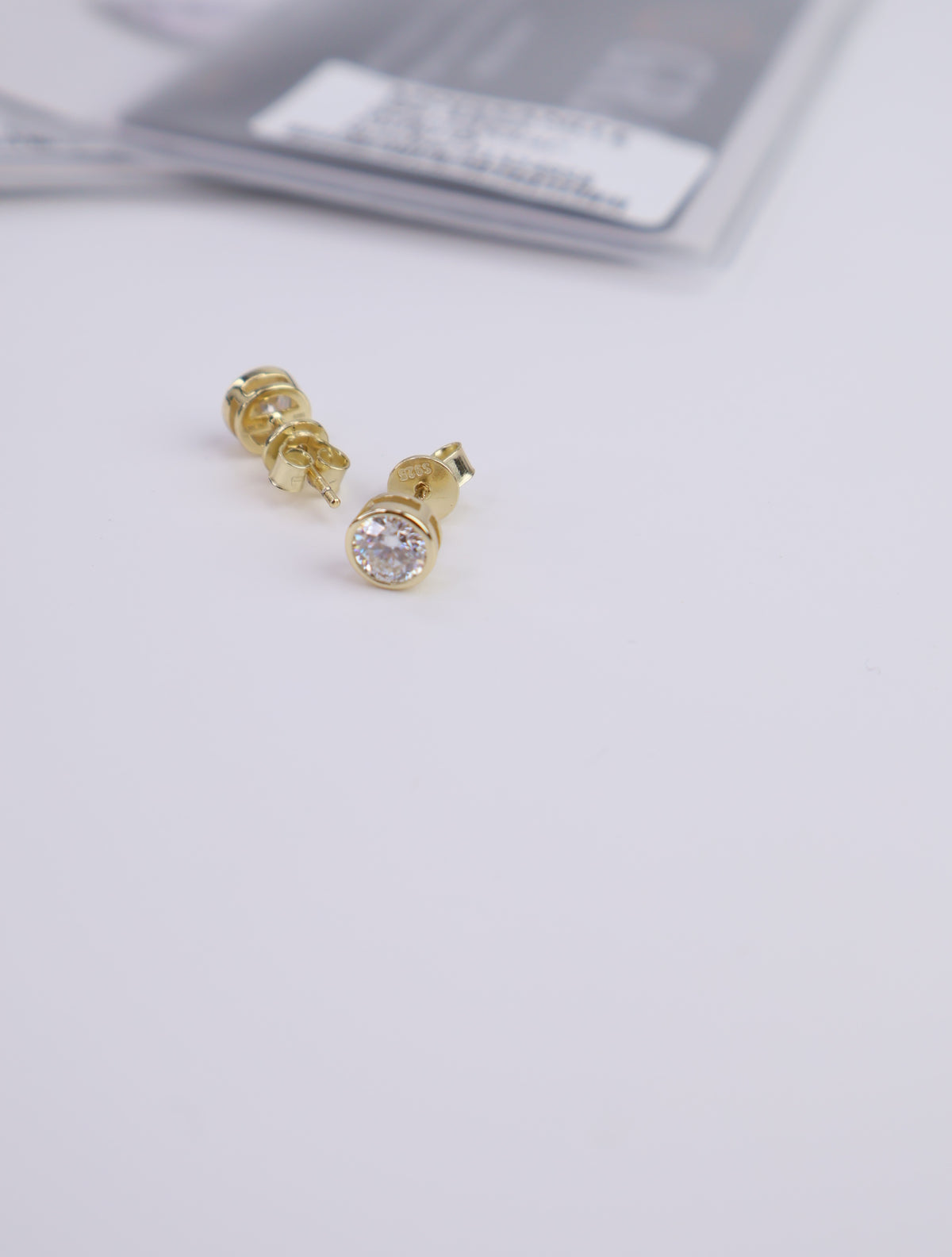Moissanite Round Bezel Stud Earrings | 0.5CT Each (1.0CT Total) | 18K Gold-Plated Sterling Silver | Certificate Included