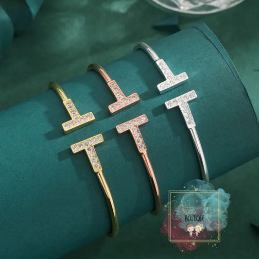 STAINLESS JEWELRY - T Bracelet - 18K Plated w/ Zircon stones