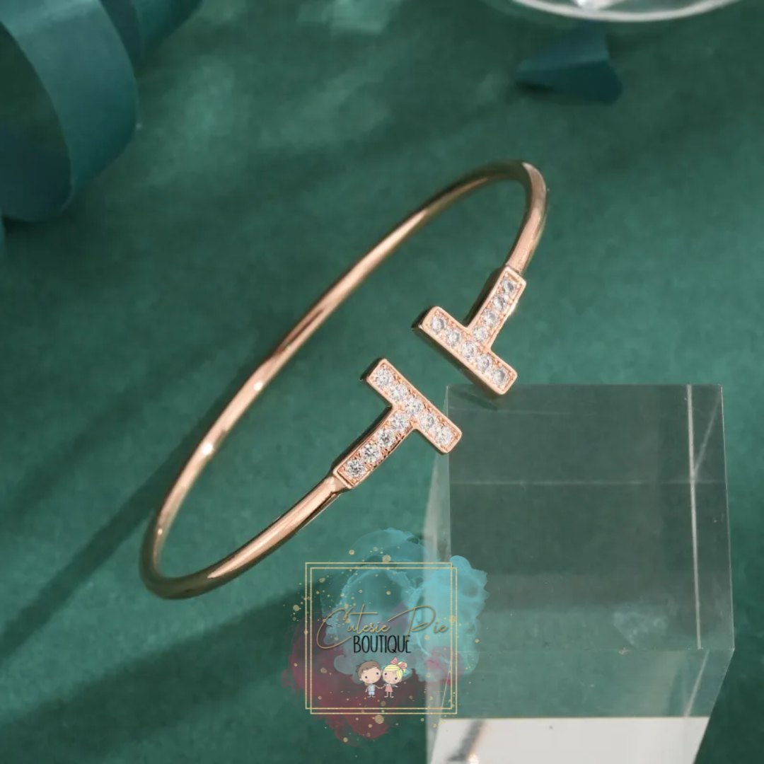 STAINLESS JEWELRY - T Bracelet - 18K Plated w/ Zircon stones