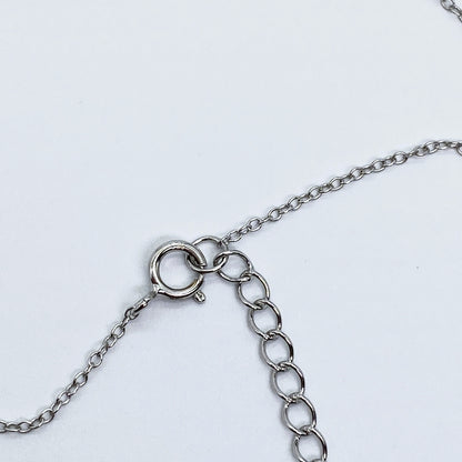 Moissanite Devotion Cross Necklace | Rhodium-Plated Sterling Silver | Certificate Included